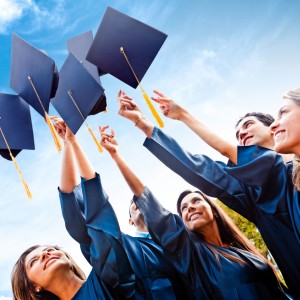 Students throwing graduation hats